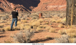 242 a2q. Utah - Happy Canyon airstrip area - Tyler taking a picture of a rabbit
