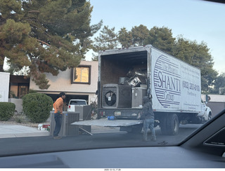 168 a2q. neighbor's house with air conditioner on the street with truck
