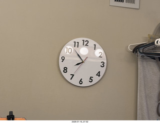 Adam nearly nude with my new bathroom mirror clock