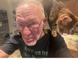 Adam with cat Pickle on my shoulder