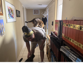 Noah and cat Pickle on his shoulders