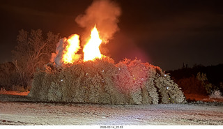 Arizona Flying Circus - night - Christmas trees under attack on fire