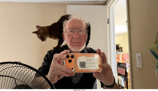 Adam with cat Pickle on my shoulder