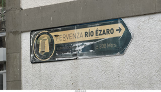 90 a2y. Spain - bus tour of north shore - river sign