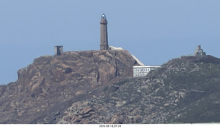 225 a2y. Spain - bus tour of north shore - lighthouse