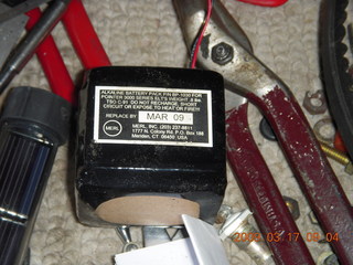 n4372j in shop with new engine - old ELT battery